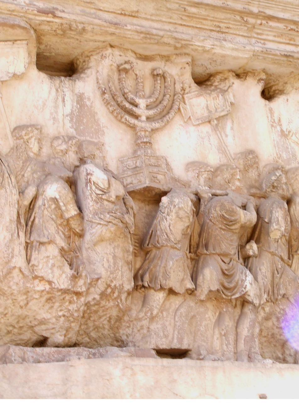 A Roman relief on the Arch of Titus showing soldiers carrying the seven-branched Temple Menorah and other spoils from Jerusalem
