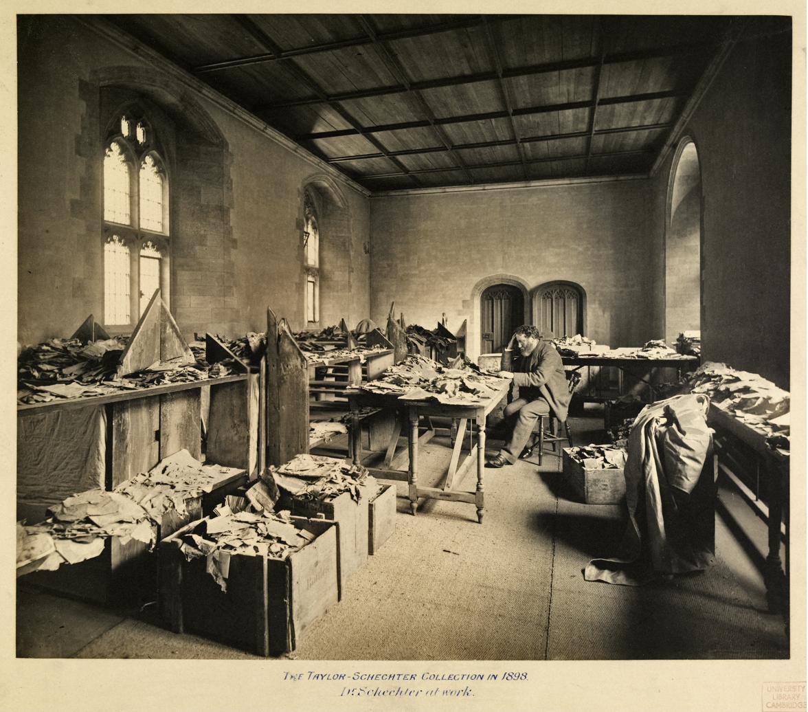Solomon Schechter studying fragments from the Cairo Geniza, c. 1898.