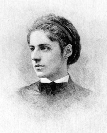 An engraved portrait of Emma Lazarus in profile, a young woman with dark hair gathered up, from an 1872 engraving.