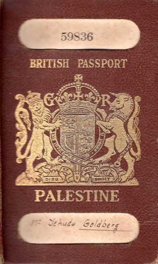The dark red cover of a British passport, embossed in gold with the British royal coat of arms and the word PALESTINE, and a handwritten name near the bottom.