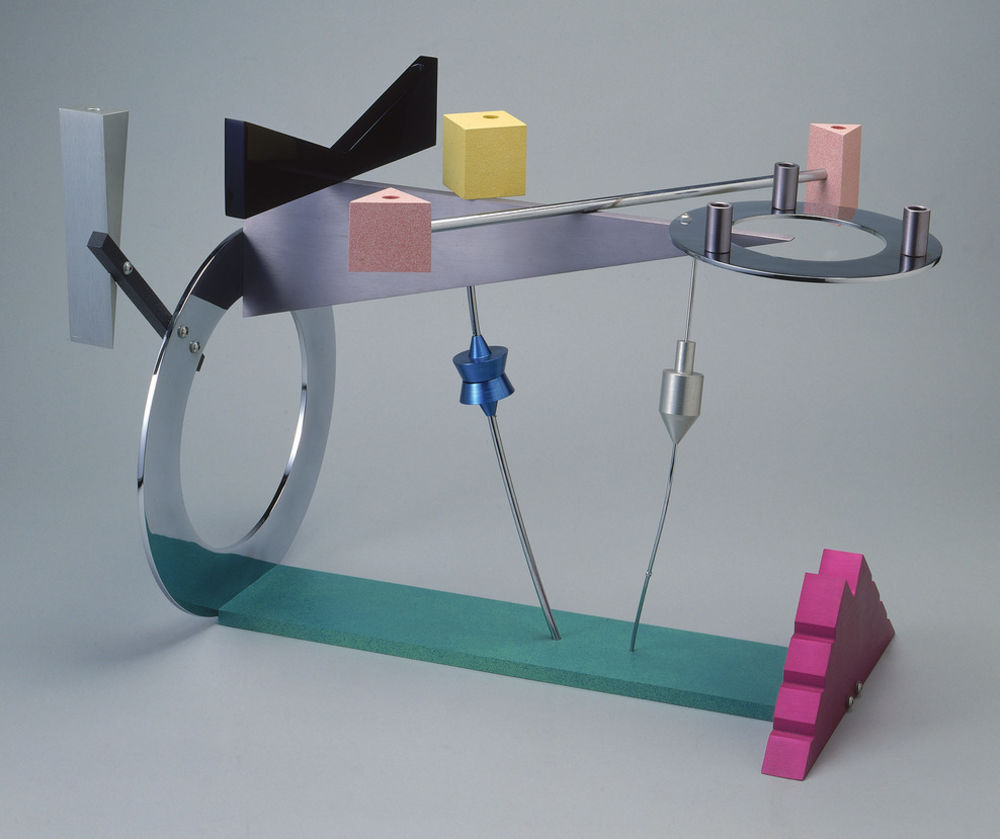 A modern Hanukkah menorah of painted steel and anodized aluminum in bold geometric forms